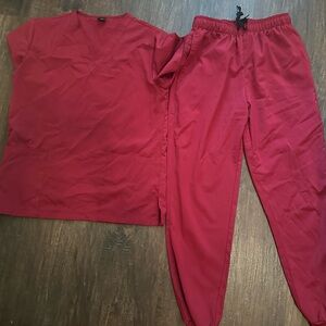 Maroon scrub set with Top and joggers.